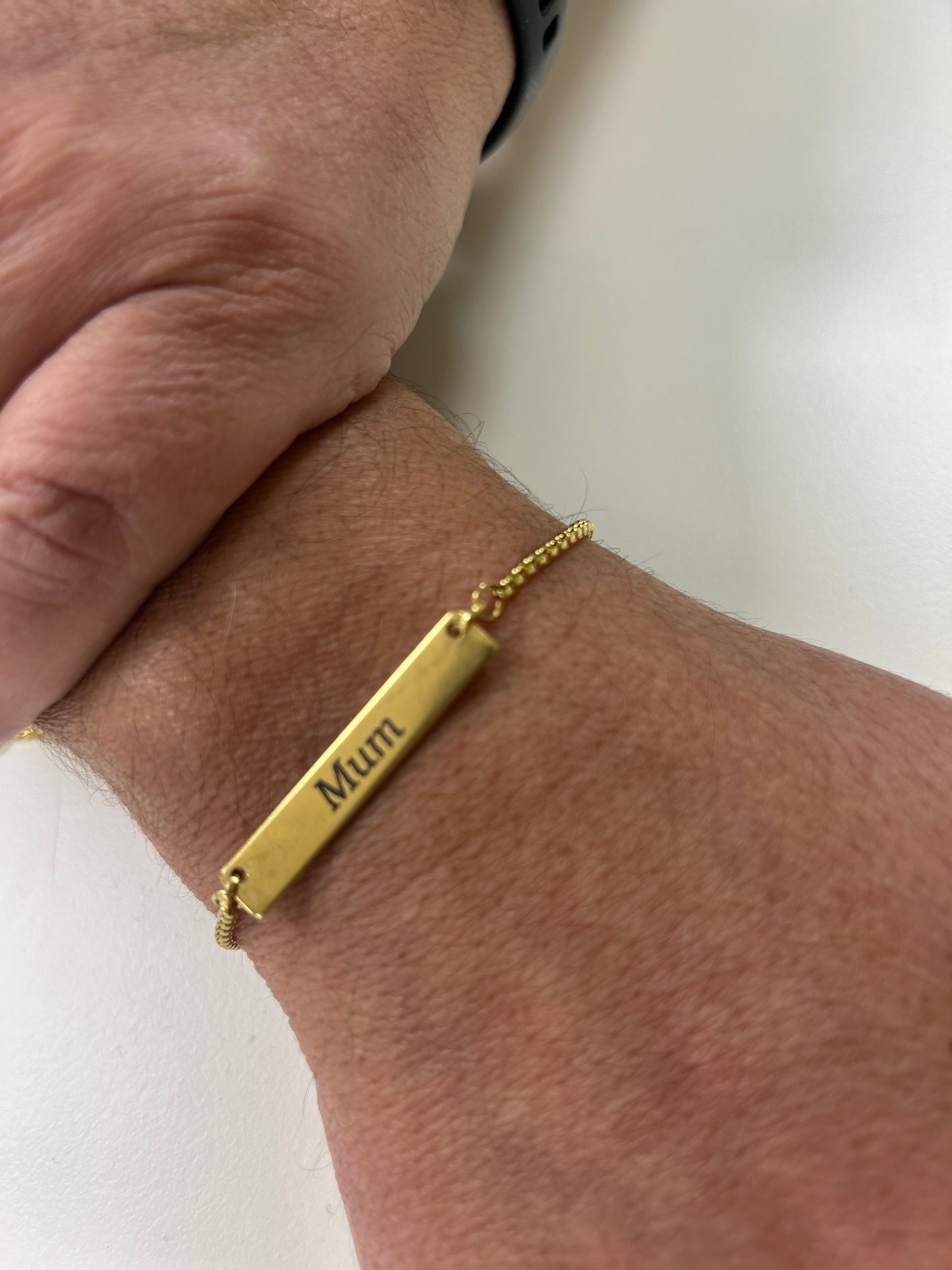 Gold engraved bracelet.