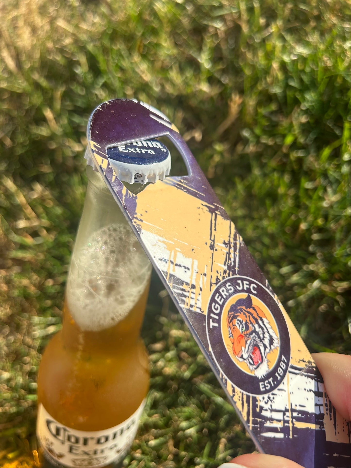 Metal bottle opener, double sided.