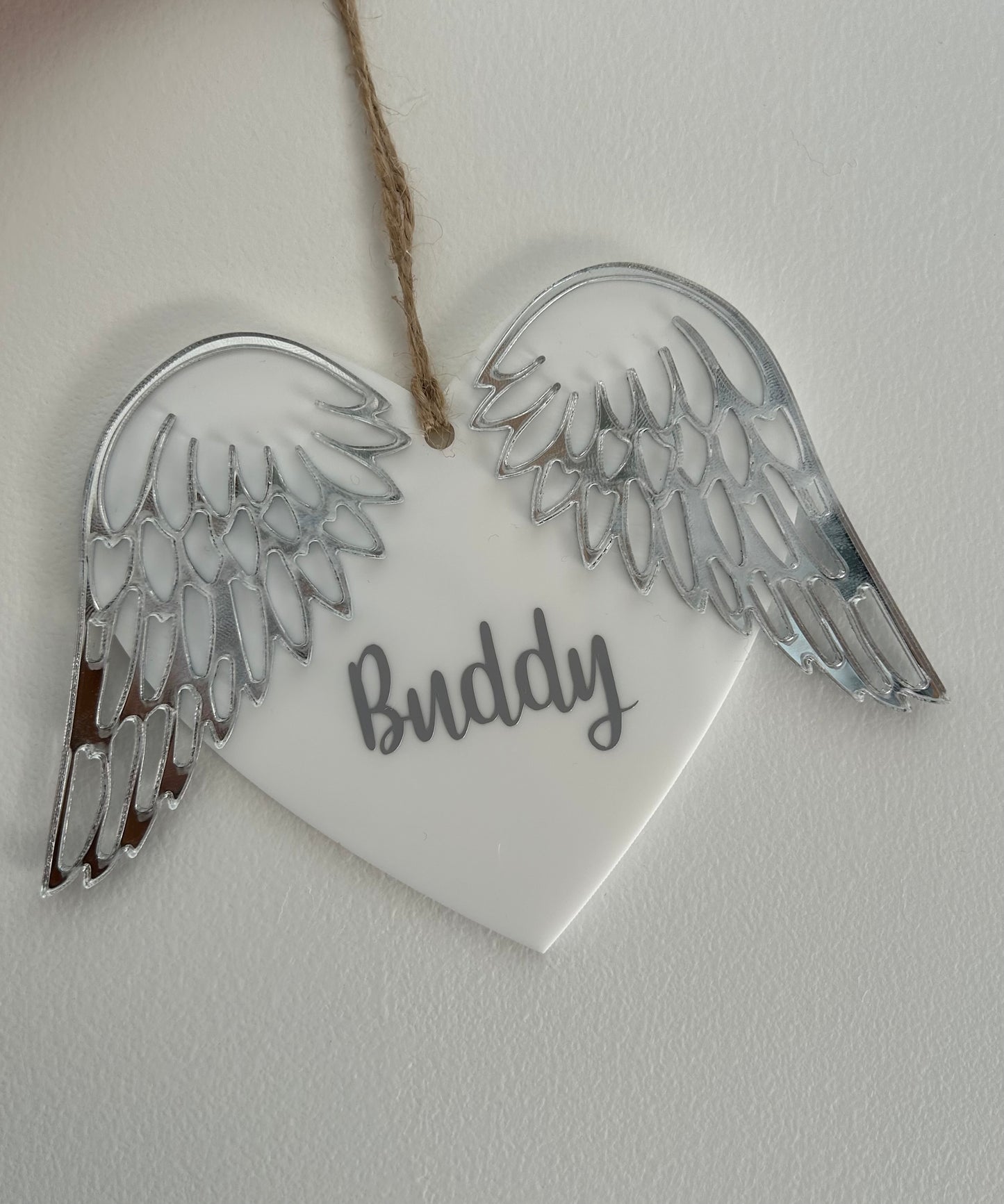 Winged heart memorial decoration.