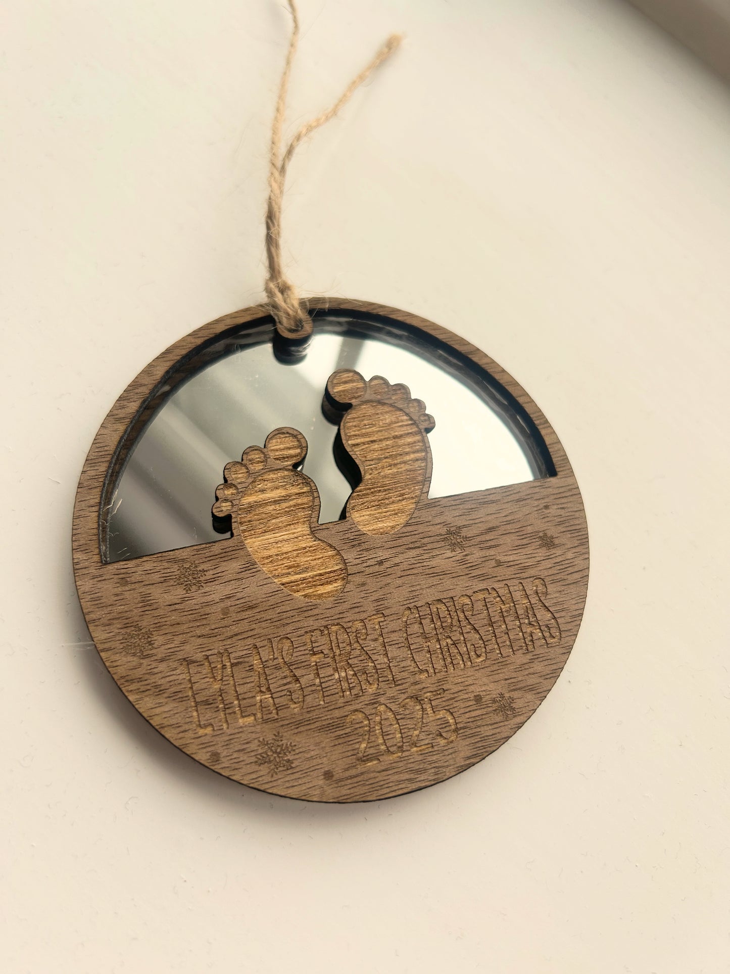 Custom engraved baby’s first Christmas decoration.