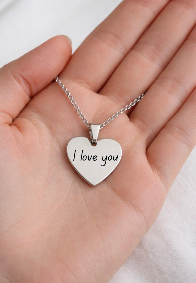 Hand written heart pendant.