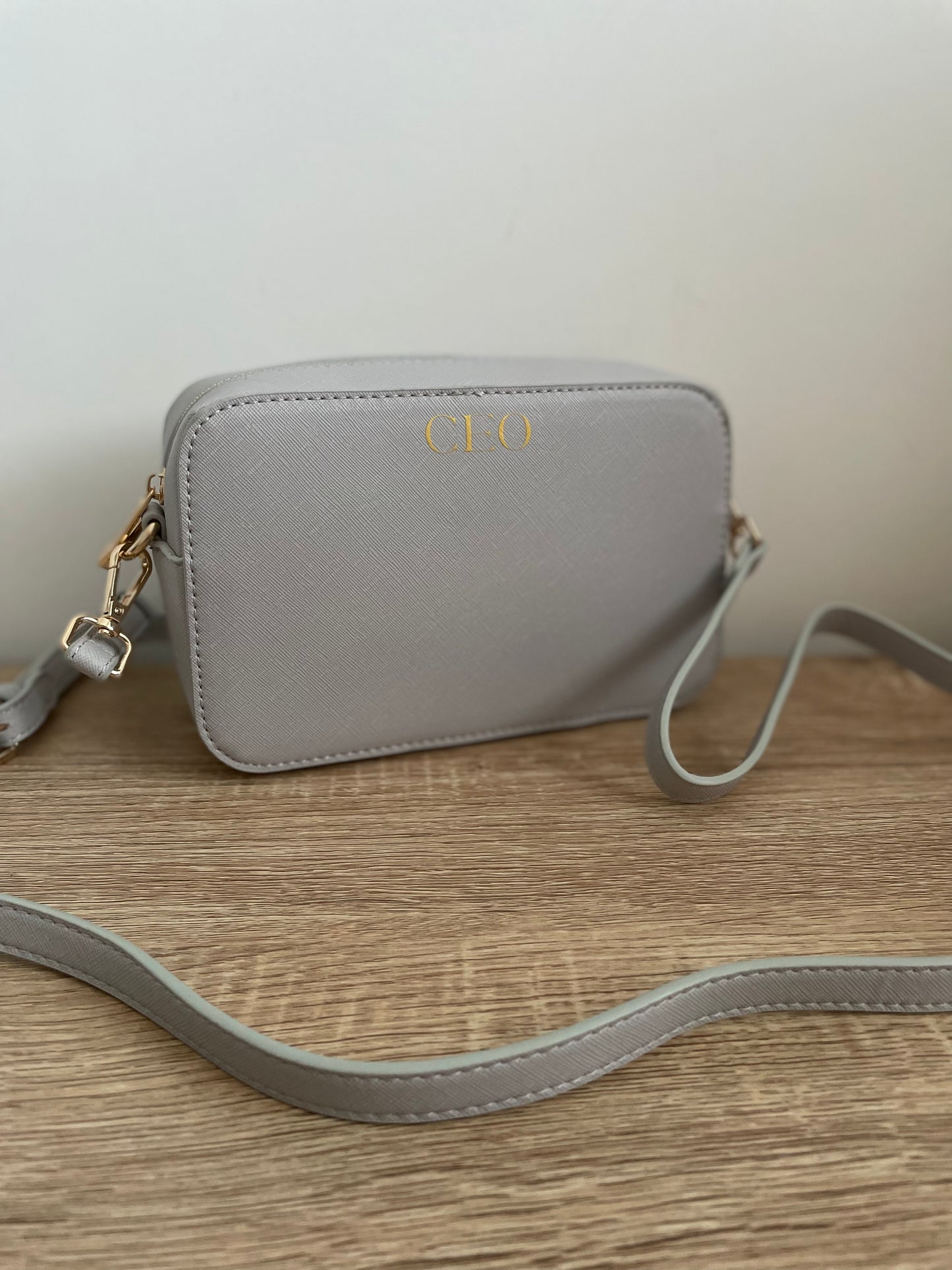 Monogrammed box cross body bag.