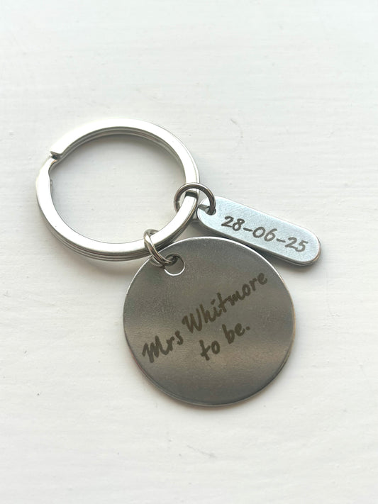 Engraved keyring with wording, no tag.