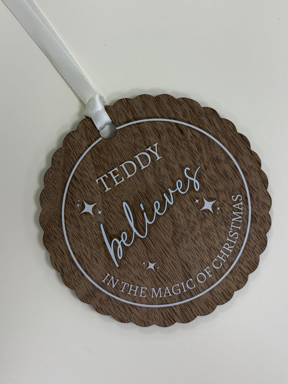 Wooden ‘believes’ personalised ornament.