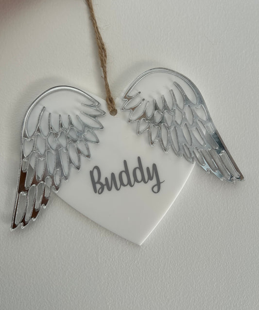 Winged heart memorial decoration.