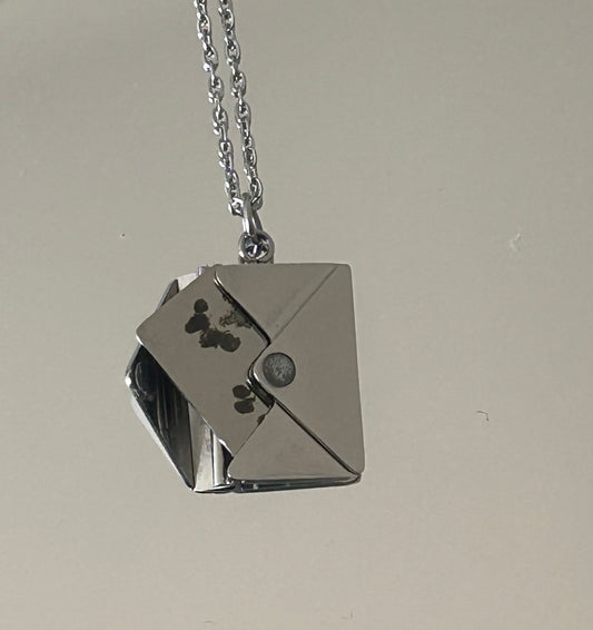 Secret message necklace.