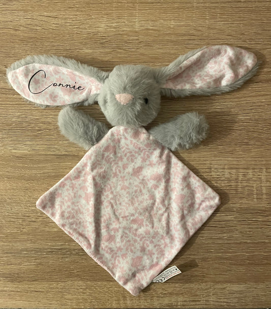 Plush bunny comforter.